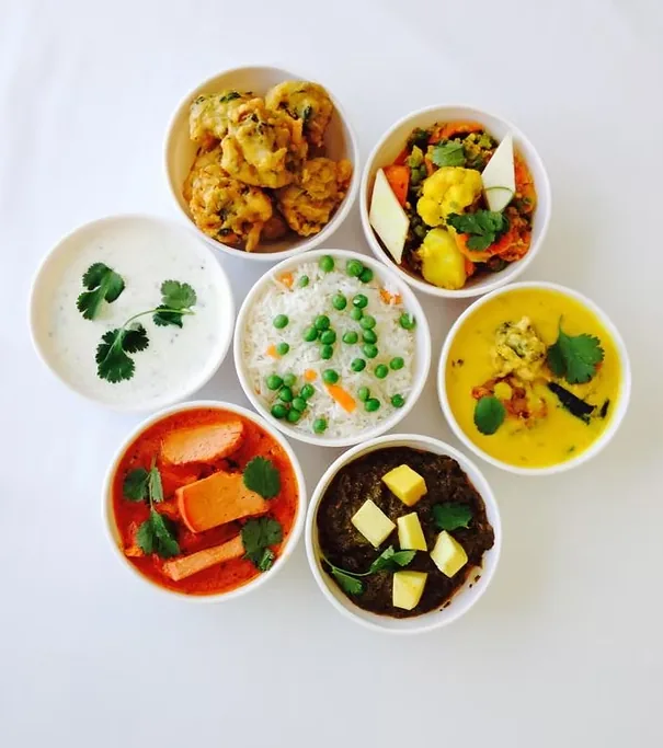 Indian dishes presented in bowls for The Jewel of India website